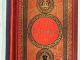 un vieux livre rouge aux tranches dorées et à la couverture rouge