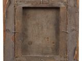 an old wooden picture frame with a tag on it