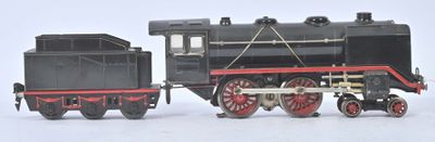 un petit train posé sur une surface blanche