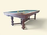 une table de billard sur laquelle est posé un triangle de billard