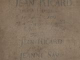 an old book with writing on it sitting on a table