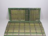 a green stained glass case with a window in it