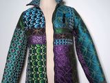 a close up of a jacket on a mannequin mannequin
