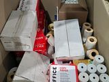 many rolls of toilet paper in a cardboard box