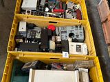 many different types of electronic equipment in the bins