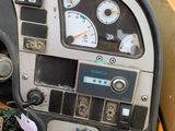 a close up of the dashboard of a bus