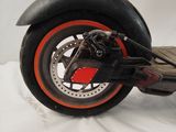 a close up of a motorcycle on a white background