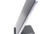 a close up of a cell phone on a stand