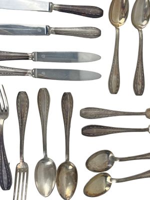 a lot of silver spoons and forks and knives