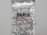 a picture of a map on the wall of a train station
