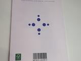 an image of a white book with a blue dot on it