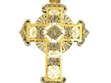 un gros plan d'une croix sur fond blanc
