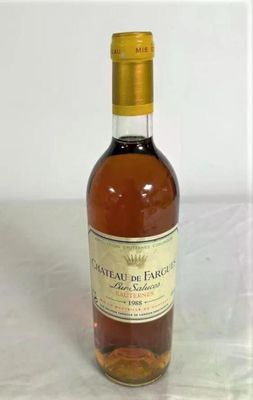 a bottle of wine that is sitting on a table