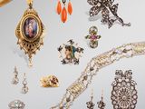 an assortment of jewelry including necklaces, bracelets, and brooches