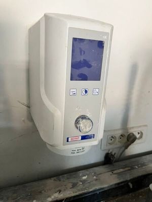 an image of a water dispenser on a wall