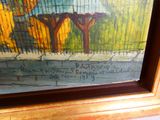 une image d'un tableau sur le mur d'un bâtiment