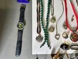 many different types of watches and bracelets on the table