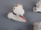 three figurines that are sitting on a table