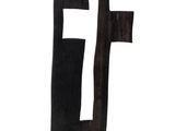 a black and white picture of a wooden letter f