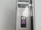 a black cell phone that is in the packaging