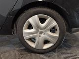 a close up view of a car ' s tire on the floor