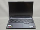a close up of a laptop computer sitting on a table