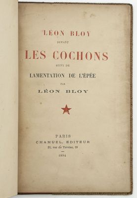 an open book with a red star on the front cover