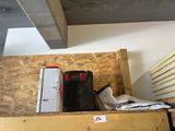a refrigerator and a refrigerator freezer sitting on top of a wooden box