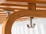 a close up of a coat rack with a coat hanger