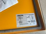 a yellow box with a label on it that says gretel