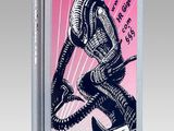 une image représentant un livre sur lequel figure l'illustration d'un extraterrestre