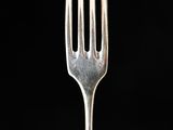 a fork that is sitting on top of a plate