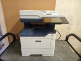 a printer that is sitting on top of a table