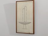 tableau accroché au mur d'une pièce blanche, dans un cadre en bois