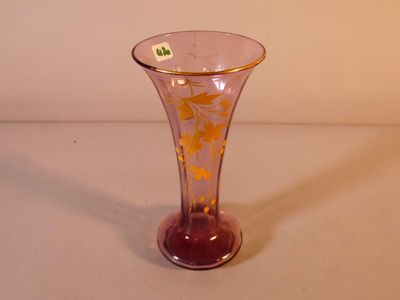 a glass vase that is sitting on a table