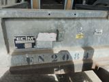 an image of a truck that has a number plate on it