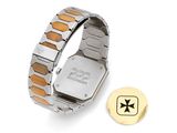 an image of a watch and a button on a white surface