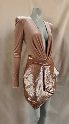 an image of a mannequin dress with a long sleeve and a belt