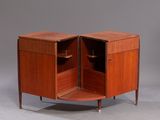 an image of a wooden cabinet with two doors open