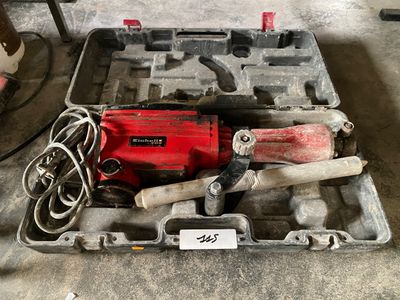 a box with tools in it sitting on the floor