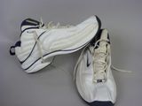 pair of white and blue sneakers with laces on them