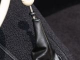 a close up of a car ' s interior with a gear stick