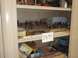 a cabinet with a lot of tools on top of it