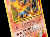 a close up of a pokemon card on a black background
