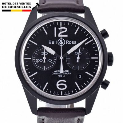 a close up of a wrist watch with a black dial