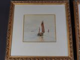 two framed paintings of sailboats on the water in a gold frame