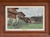 framed picture of a painting of a village in the mountains