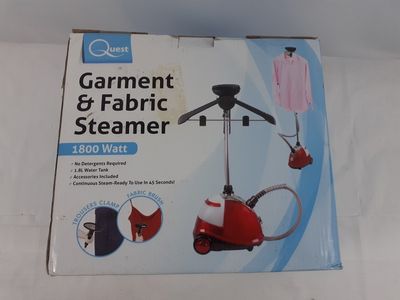 une image représentant un panier-vapeur rouge et blanc posé sur une table blanche