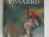a picture of a book with a picture of a woman sitting on a rock