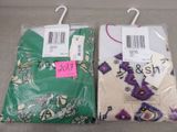 two pairs of green and white shirts with a price tag on them